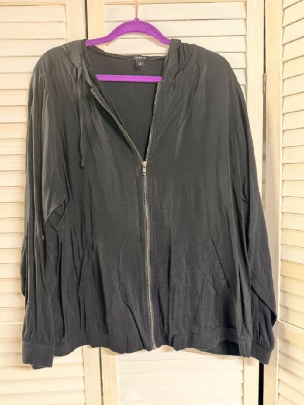 black hooded zip-up